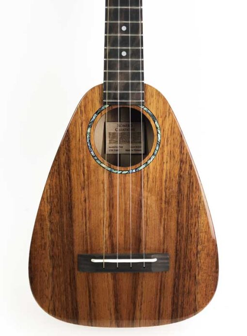 Tiny tenor koa close